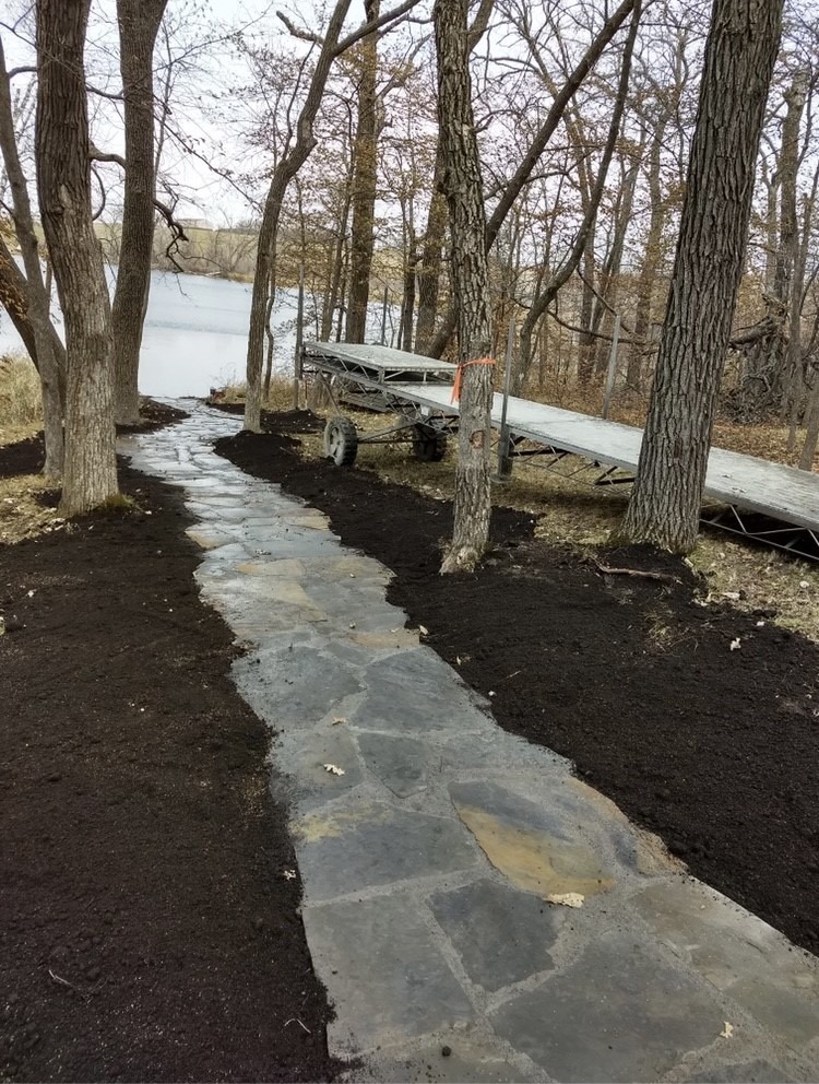 Beautiful stone trail leading to lake